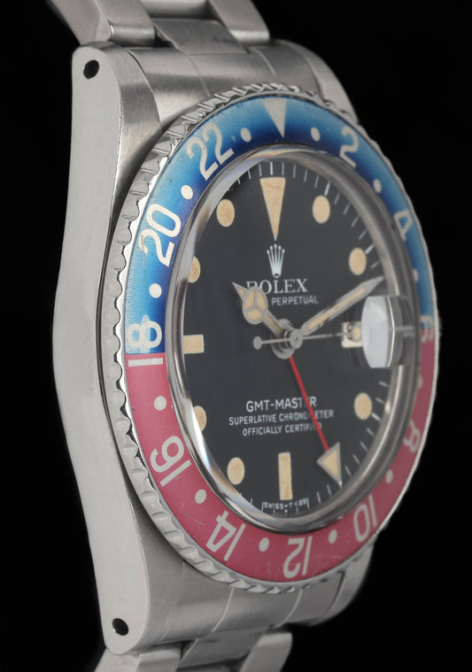 Preowned vintage Rolex GMT Master 1675 'Fuchsia' Pepsi 40MM 1968 | Crown Vintage Watches