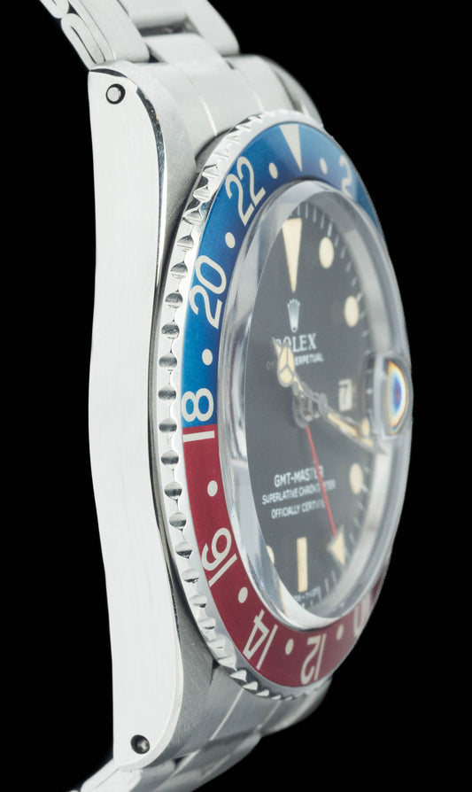 Preowned vintage Rolex GMT Master 1675 Pepsi 'Mk1' Tropical 40mm 1966 | Crown Vintage Watches