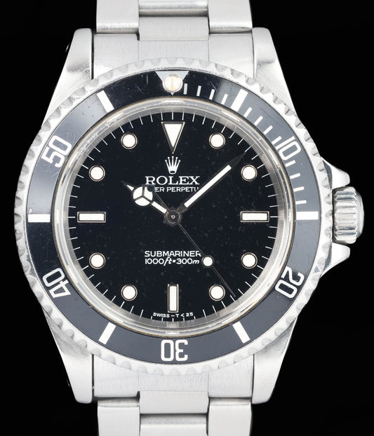 Preowned vintage Rolex Submariner 14060 40mm 1996 | Crown Vintage Watches