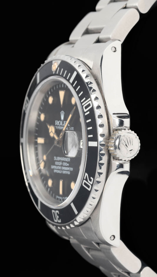 Preowned vintage Rolex Submariner 16800 'Pumpkin Dial' 40mm 1984 | Crown Vintage Watches