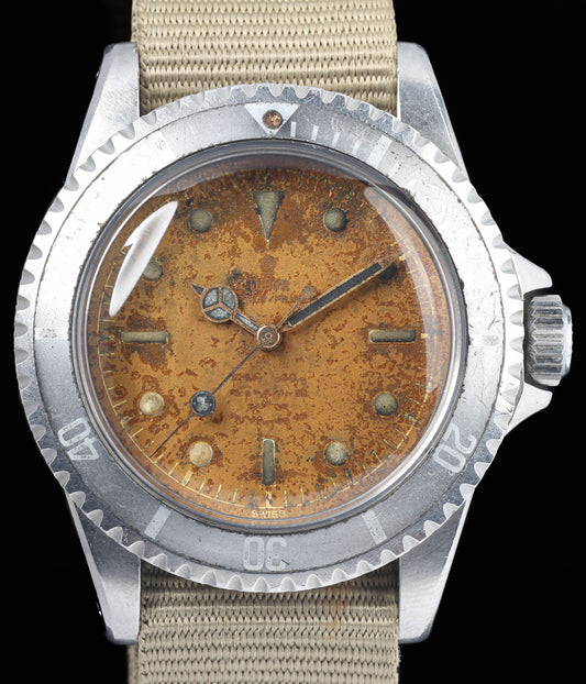 Preowned vintage Tudor Submariner Oyster-Prince 7928 'Tropical' Eagle Beak 40MM 1960 | Crown Vintage Watches