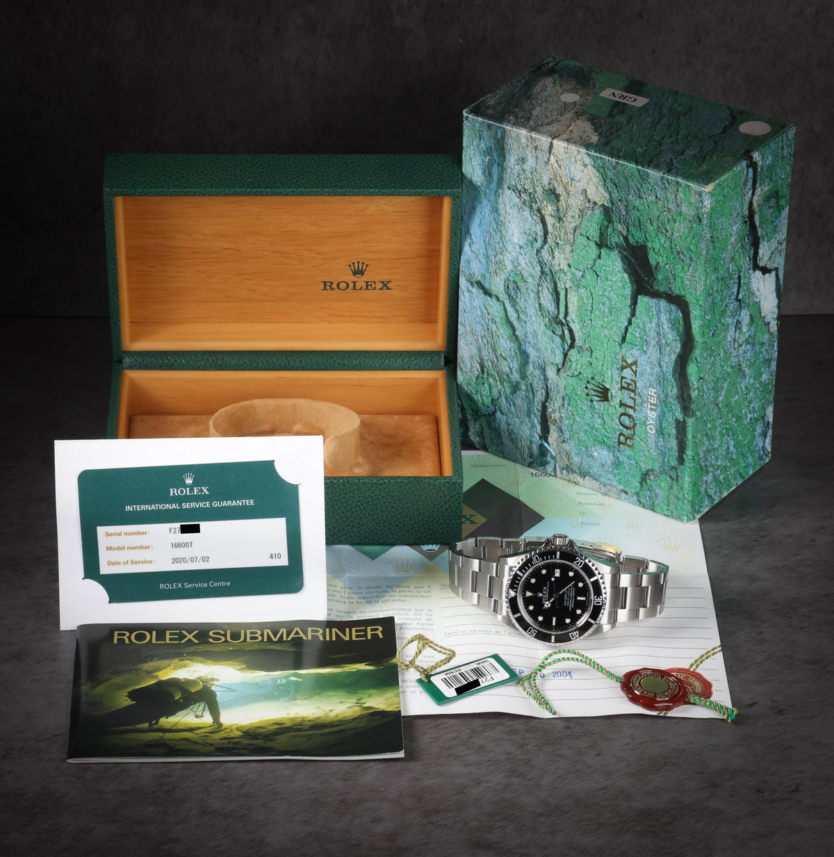 Preowned vintage Rolex Sea Dweller 40MM 'Swiss Made' 16600 2004 Box & Papers | Crown Vintage Watches