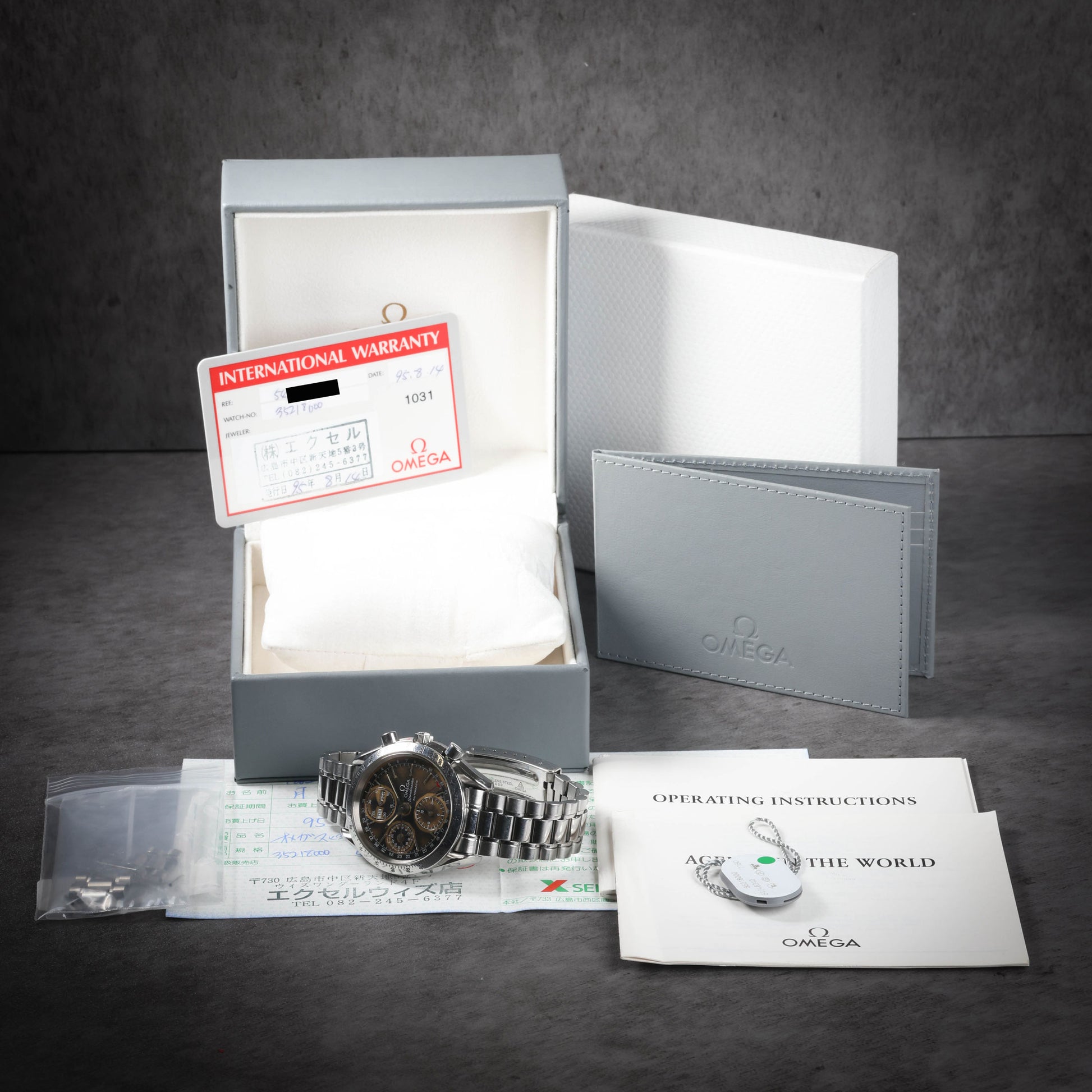 Preowned vintage Omega Speedmaster Day-Date 'Tropical' 3521.80 39mm 1995 Box & Papers | Crown Vintage Watches