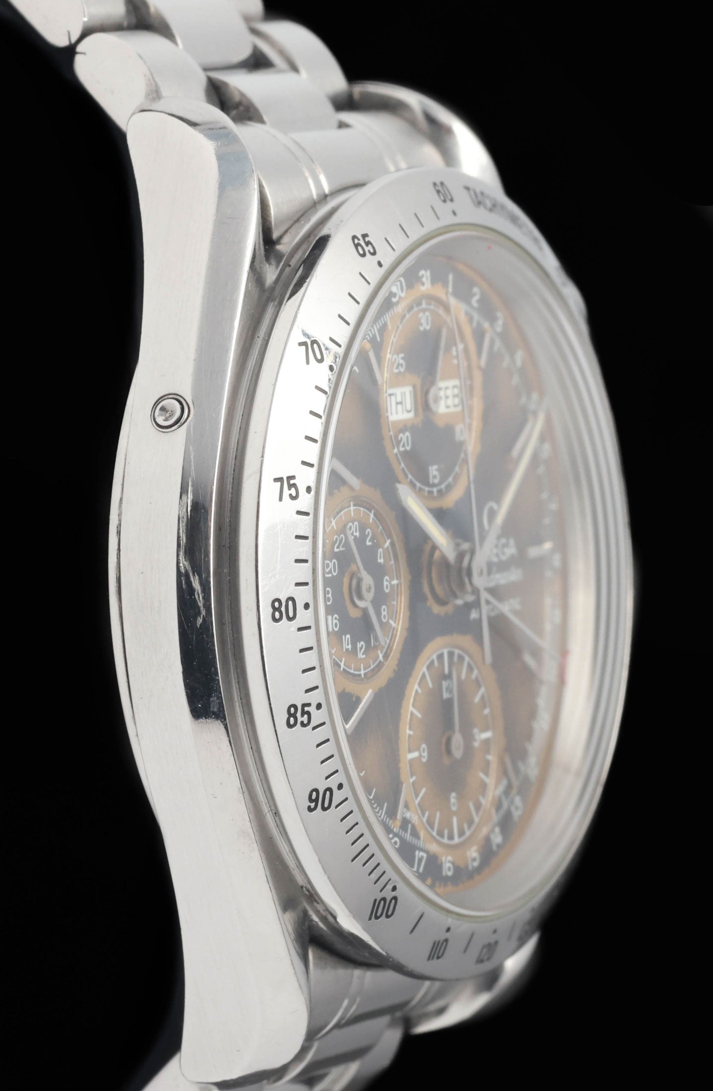 Preowned vintage Omega Speedmaster Day-Date 'Tropical' 3521.80 39mm 1995 Box & Papers | Crown Vintage Watches