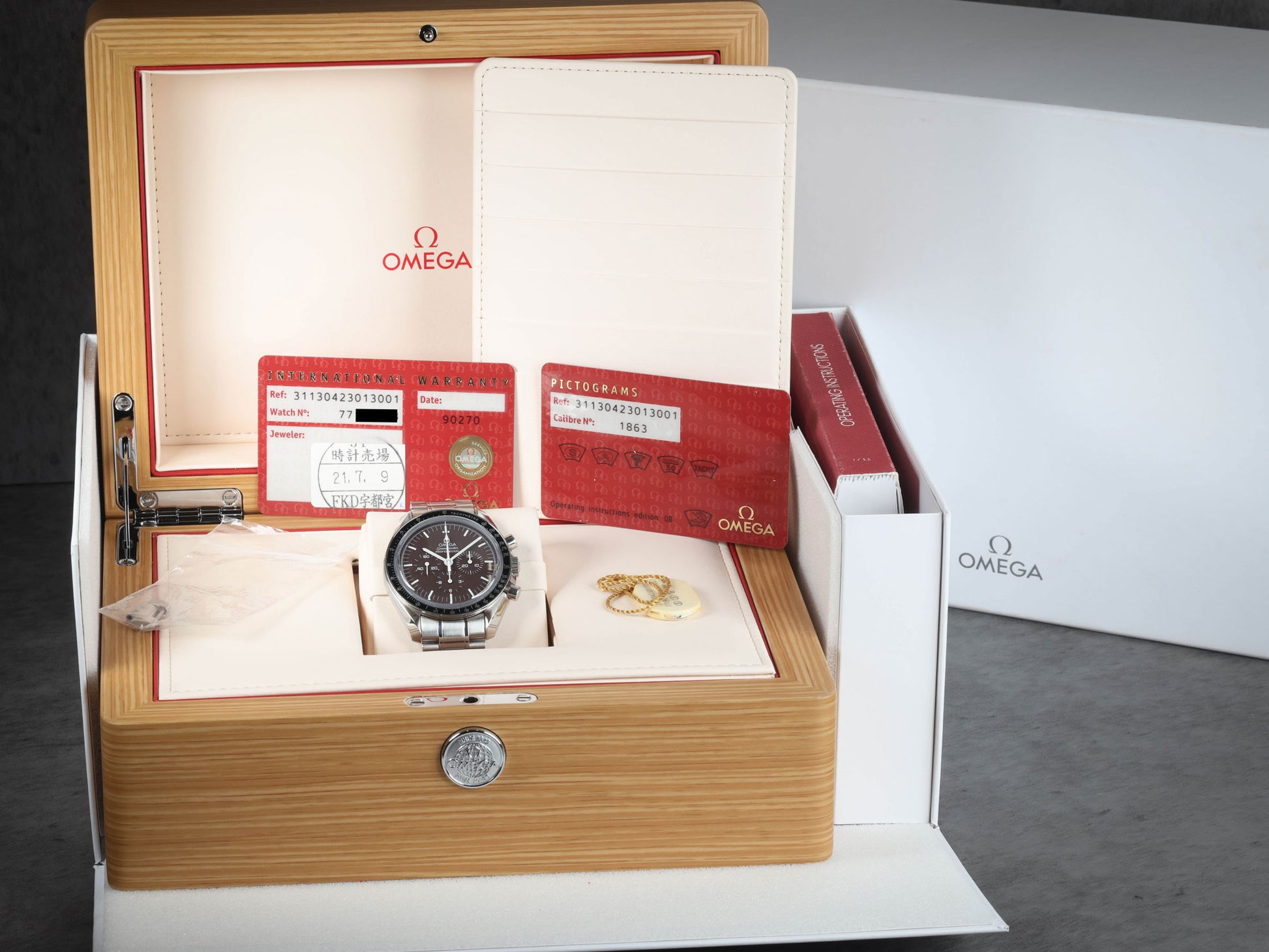 Preowned vintage Omega Speedmaster Professional 'Chocolate' 42MM Ref 311.30.42.30.13.001 Box & Papers Circa 2010 | Crown Vintage Watches