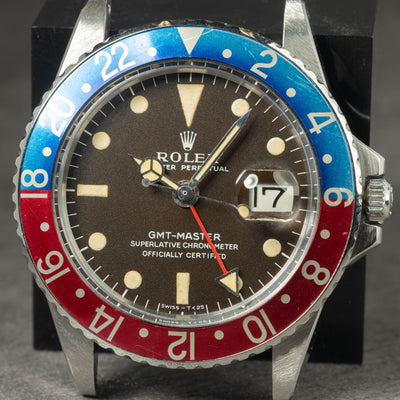 Preowned vintage Rolex GMT Master 1675 Pepsi 'Mk1' Tropical 40mm 1966 | Crown Vintage Watches