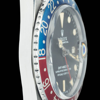 Preowned vintage Rolex GMT Master 1675 Pepsi 'Mk1' Tropical 40mm 1966 | Crown Vintage Watches