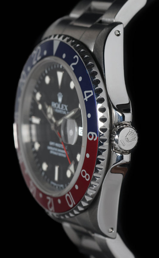 Pre-owned vintage Rolex GMT Master II 16710 40MM 1993 Box & Papers | Crown Vintage Watches