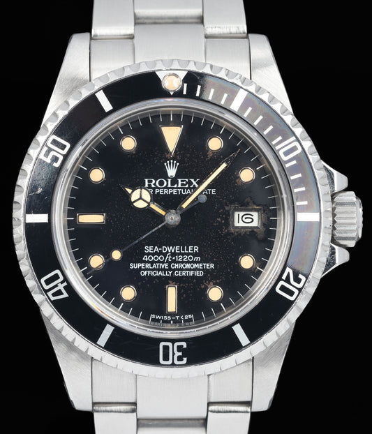 Preowned vintage Rolex Seadweller 16660 'Tropical' 40MM 1984 | Crown Vintage Watches
