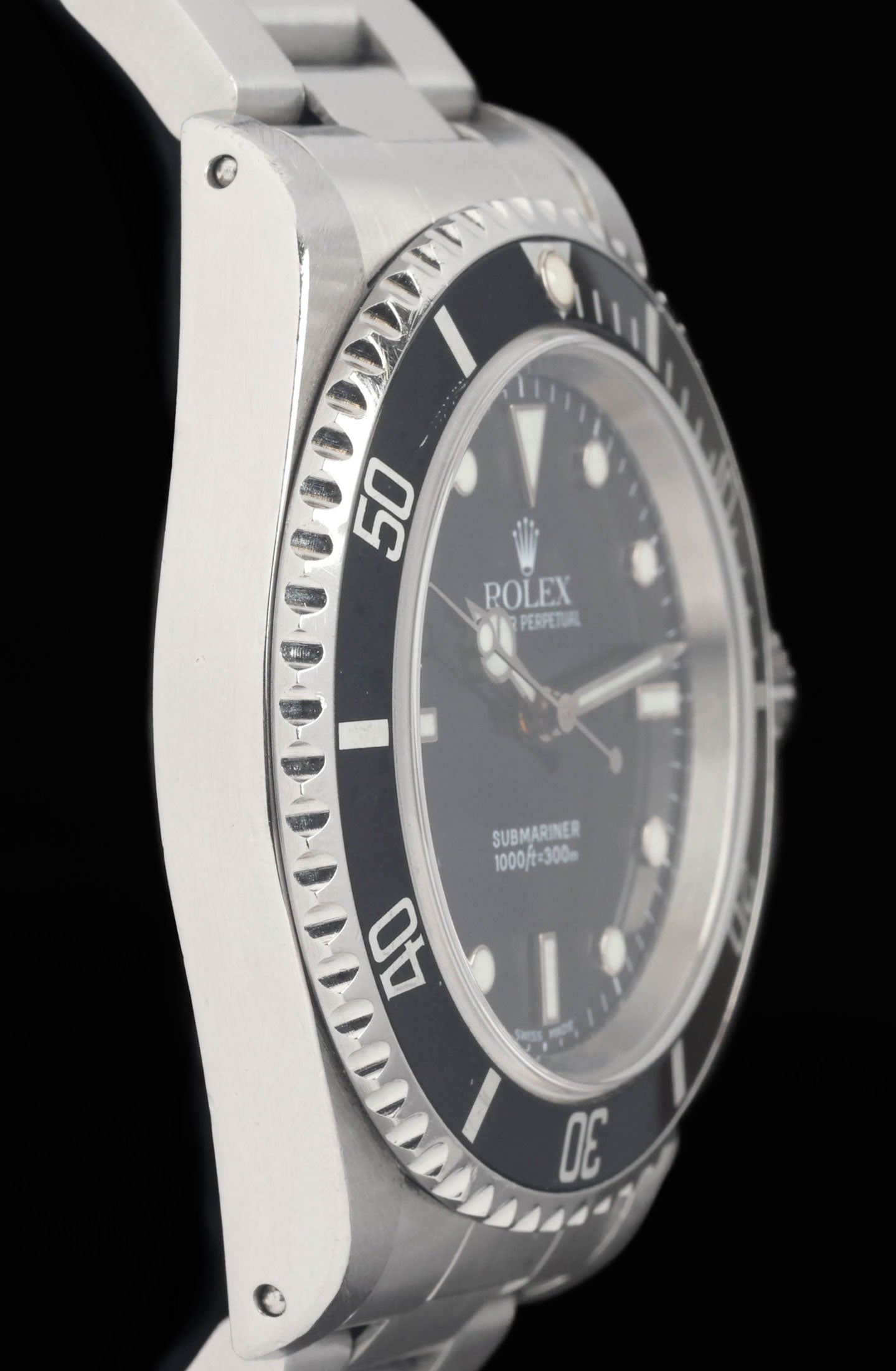 Preowned vintage Rolex Submariner 14060 40MM 1999 | Crown Vintage Watches