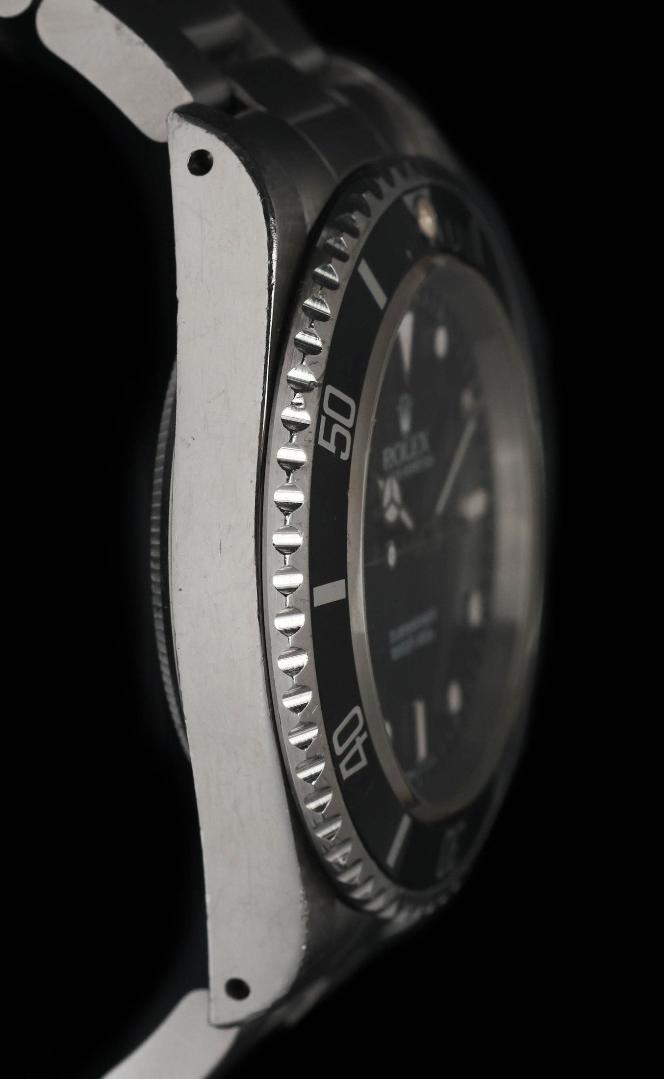 Pre-owned vintage Rolex Submariner 14060 40mm 1995 | Crown Vintage Watches