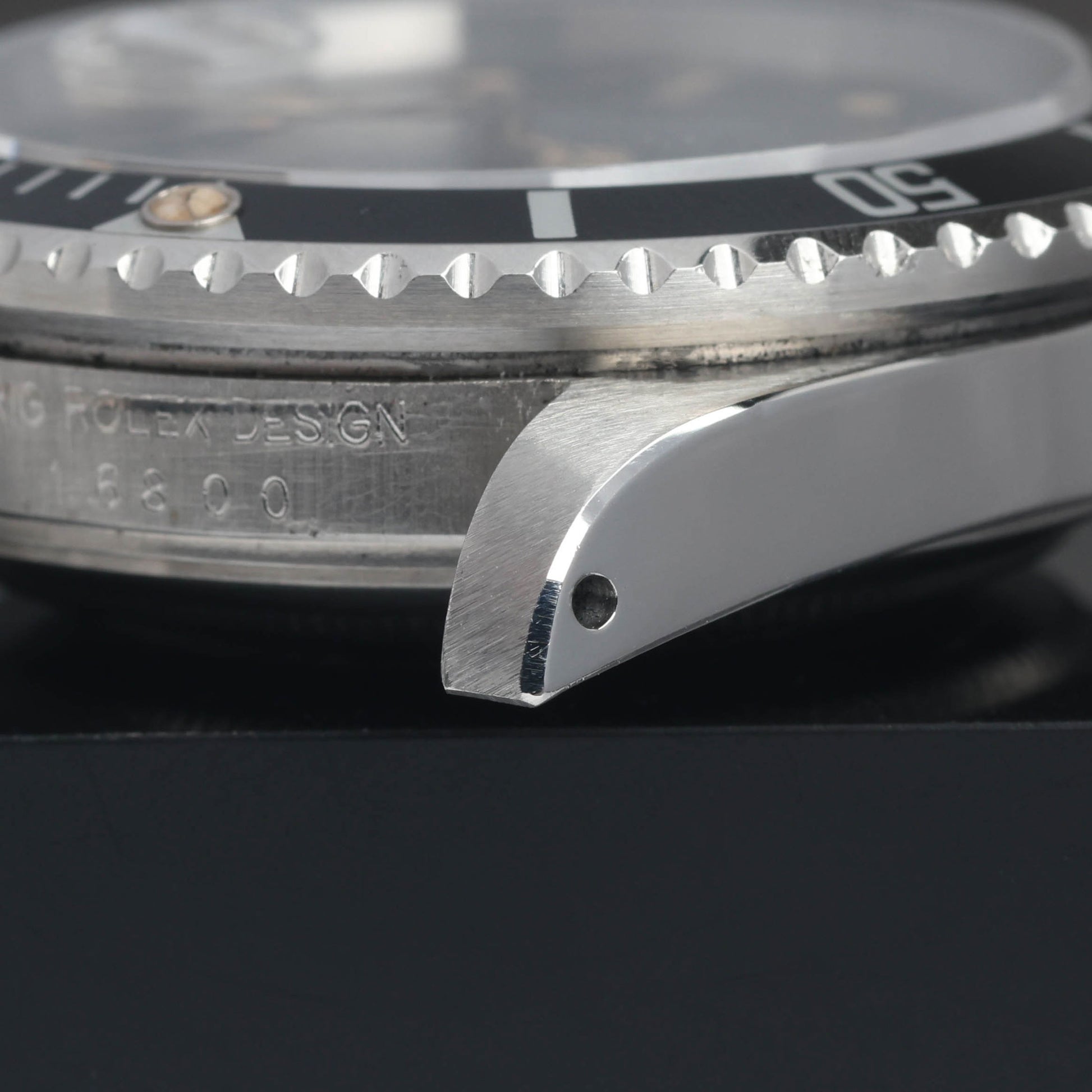 Preowned vintage Rolex Submariner 16800 'Pumpkin Dial' 40mm 1984 | Crown Vintage Watches