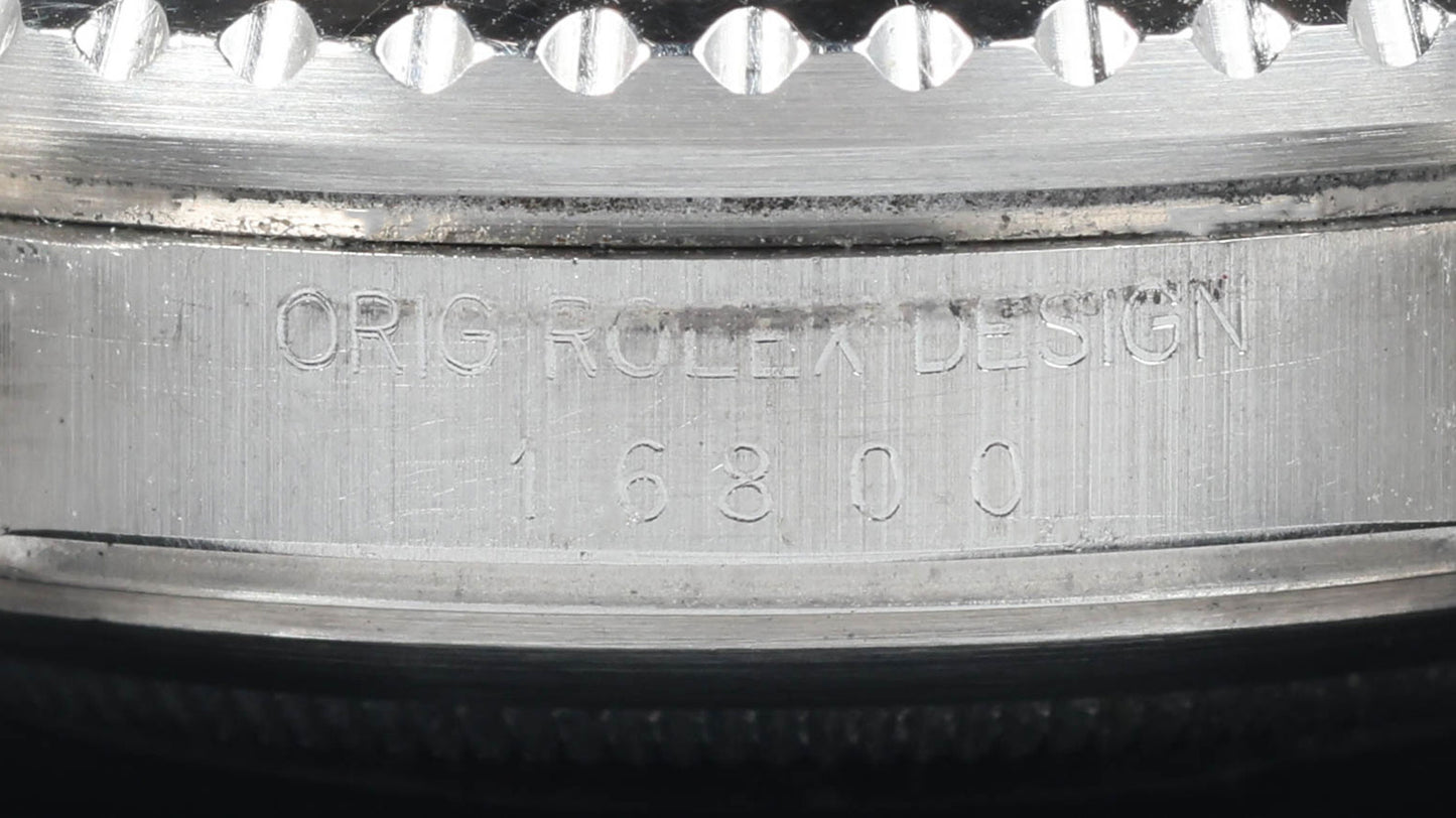 Preowned vintage Rolex Submariner 16800 'Pumpkin Dial' 40mm 1984 | Crown Vintage Watches