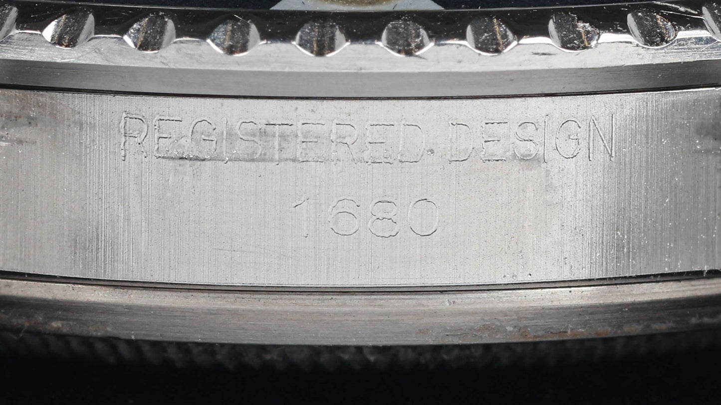 Preowned vintage Rolex Submariner Date 1680 MK4 'Red' 40mm 1971 | Crown Vintage Watches