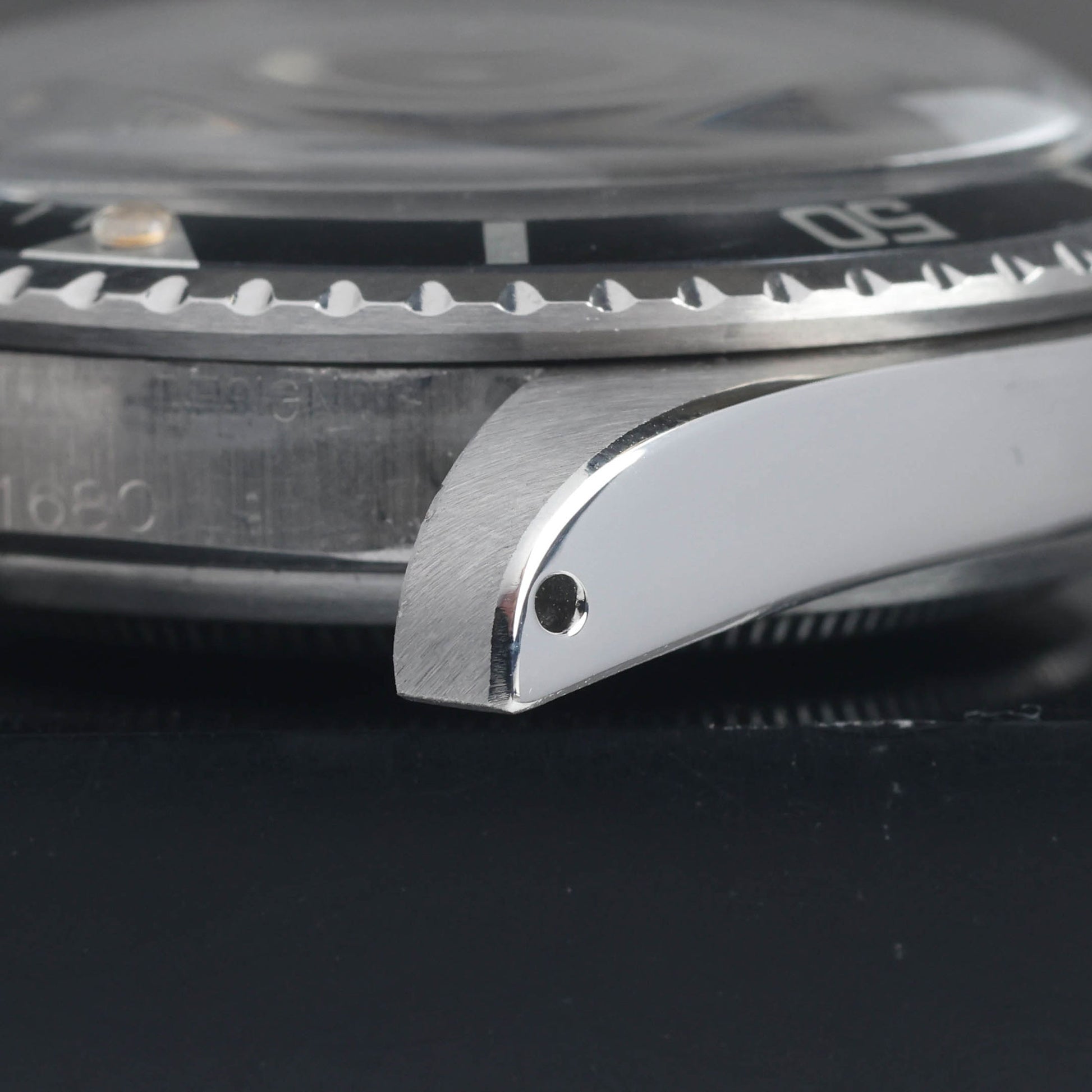 Preowned vintage Rolex Submariner Date 1680 'Red' MK2 Tropical Meters First 40mm 1970  | Crown Vintage Watches