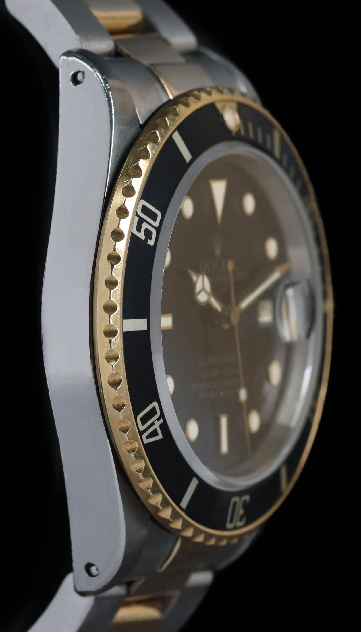 Pre-owned vintage Rolex Submariner Two-Tone Tropical Stardust 16803 40mm 1988 | Crown Vintage Watches